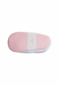 Suola di scarpa rosa con grip in gomma testurizzata, caratterizzata da una striscia centrale bianca e bordi cuciti, progettata per trazione e comfort.