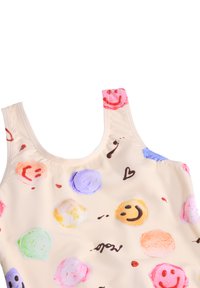 Maillot de bain beige avec des imprimés colorés de glaces et de visages souriants. Conçu avec des bretelles fines, fabriqué à partir d'un matériau lisse et extensible.