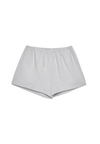 Pantalones cortos de color gris claro, fabricados en un tejido suave, que cuentan con una cinturilla elástica y un corte holgado, diseñado de manera limpia y sencilla.