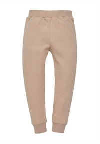 Pantaloni della felpa beige con una texture morbida, gambe affusolate e vita e polsini a costine per una vestibilità comoda. Senza tasche o dettagli aggiuntivi.