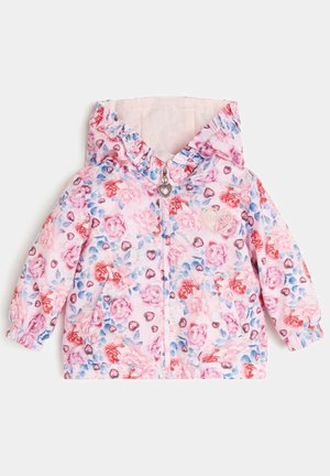 Roze jasje met bloempatronen en een capuchon, voorzien van een ritssluiting aan de voorkant, elastische manchetten en een hartvormige accent. Voering van fleece aan de binnenkant.