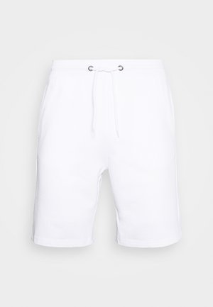 Białe, luźne szorty do kolan z elastycznym pasem i sznurkiem do wiązania z przodu, prezentowane na jednolitym tle.