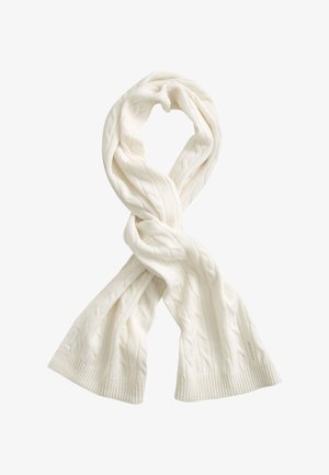 Écharpe blanche tricotée avec un motif torsadé, bouclée librement avec des bords côtelés, présentée sur fond blanc.