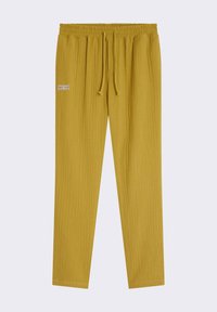 Pantalon tissé jaune, texturé, avec une taille élastique et un cordon de serrage. Présente une petite étiquette de marque à l'avant. Design à jambe fuselée.