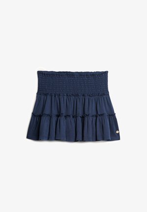 Marineblaues, gesmokes Baumwollrock mit rüschendem Saum, ausgestattet mit einem strukturierten Oberteil und einem dekorativen Hardware-Detail an der Seite.