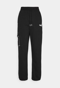 Pantalones de chándal negros fabricados en una suave mezcla de algodón, con cintura con cordón, bolsillo lateral con cremallera y detalle de logo en blanco en el muslo.