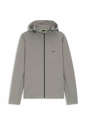 Lichtgrijze capuchonjas met een volledige rits aan de voorkant, zwarte accenten en een subtiel logo. Gemaakt van soepel, lichtgewicht materiaal.