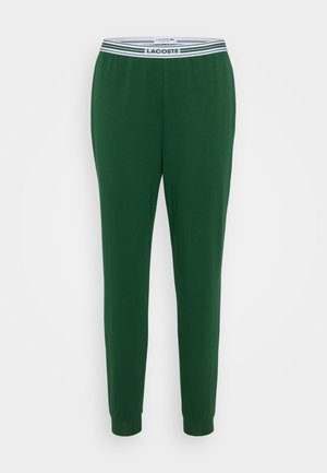 Gröna bomullshängselbyxor med ribbad midja i vitt och marinblått, som smalnar av vid anklarna för en åtsittande look.