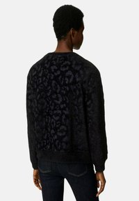 Marks & Spencer ANIMAL PRINT COSY SWEATSHIRT granatowy melanż
