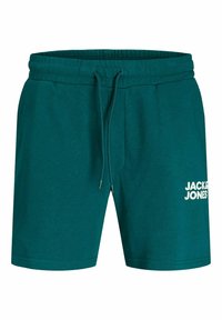Teal cotton shorts with an elastic waistband and drawstring. Features a white logo printed on the lower left side.