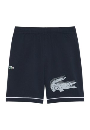 Shorts blu navy con vita elastica, bordi bianchi e due loghi di coccodrillo: piccolo sulla coscia sinistra e grande decorato sulla coscia destra.