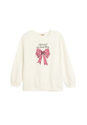 Cremefarvet sweatshirt med rund hals, lange ærmer og et stort grafisk print af en lyserød leopard-bow samt en sort tekstslogan ovenfor.