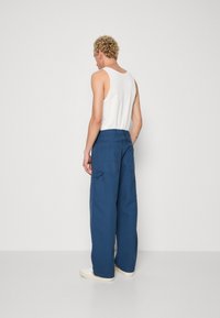 Carhartt WIP WIDE PANEL PANT - Stolarske traperice - blue-grey