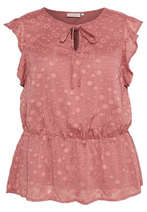 Różowa przezroczysta bluzka bez rękawów z teksturowanym wzorem kół, dekoltem typu keyhole z wiązaniem z przodu i marszczoną talią z falbanianym dołem.