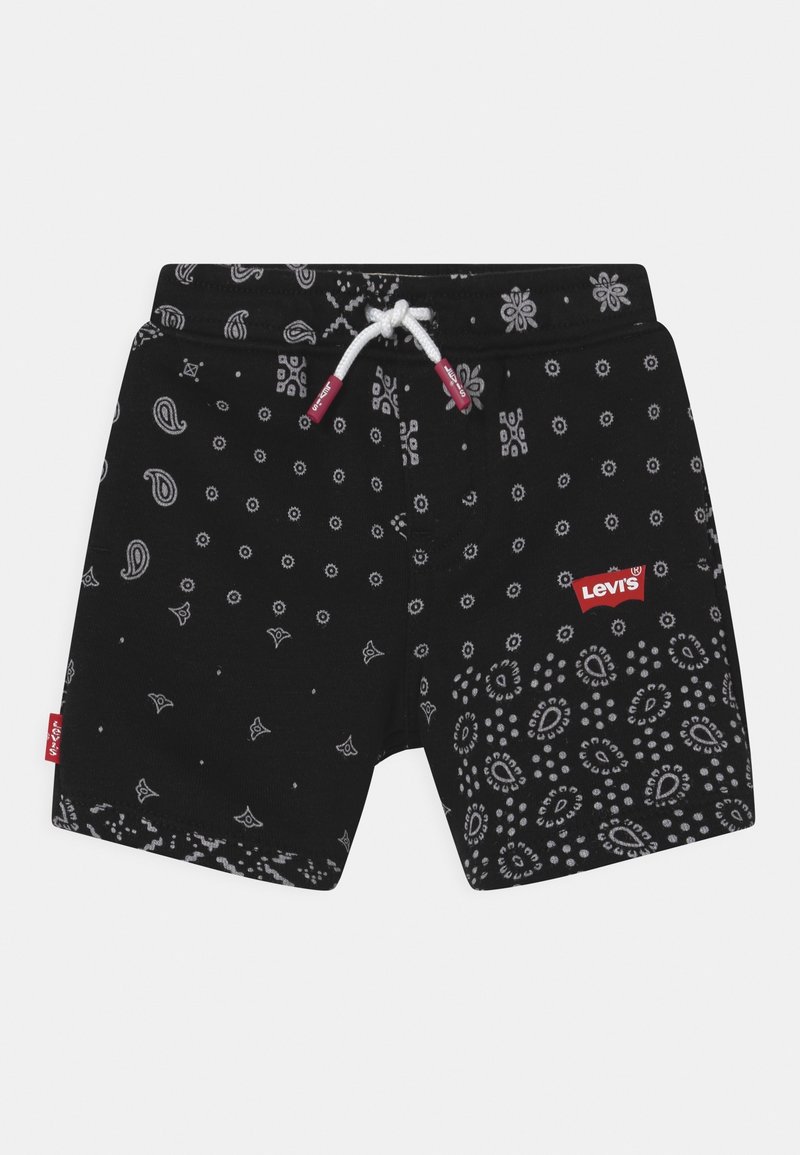 Short noir avec motifs paisley blancs et petits motifs floraux, cordon blanc avec embouts rouges et logo rouge Levi's sur la jambe droite.