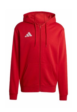 Sweat à capuche rouge zippé avec poches avant, capuche à cordon et logo triangulaire blanc sur le côté gauche de la poitrine.