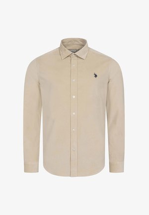 Beige long-sleeve button-up shirt with collar and small dark embroidered logo on the left chest.
