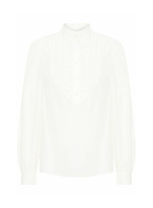 Bela dolga srajca z dolgimi rokavi z visokim ovratnikom, nabranim sprednjim delom, podrobnostmi v obliki šivov in nabranimi rameni. Mehka, gladka tkanina in zapiranje z gumbi.