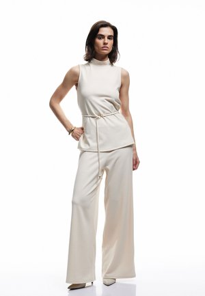 PALAZZO - Pantalones - beige