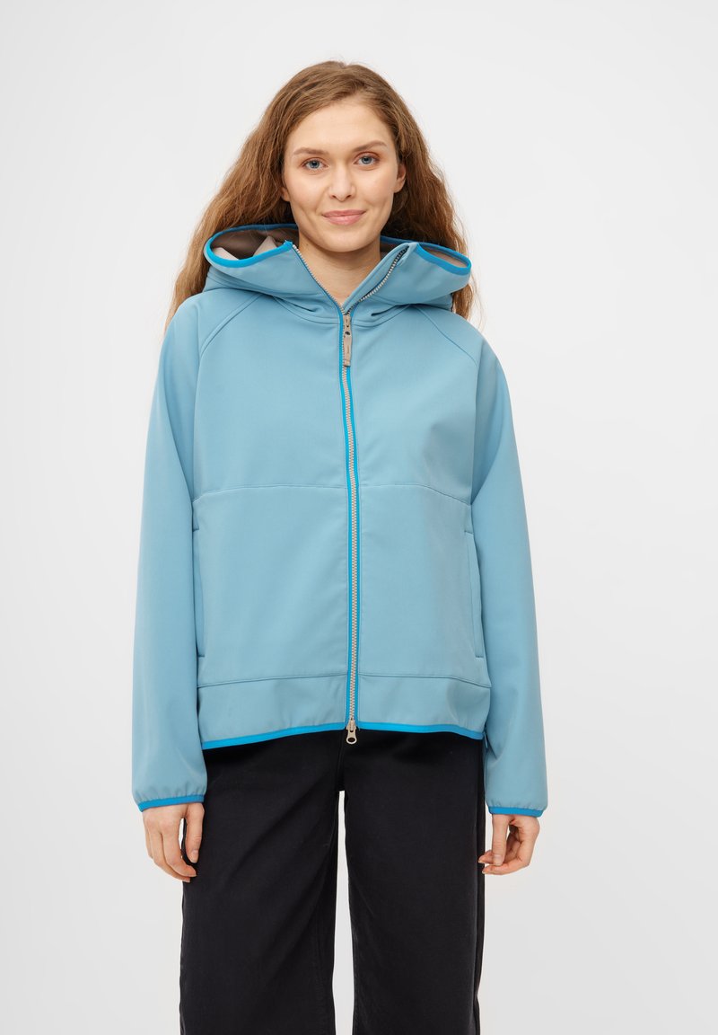 Ljusblå zip-up-jacka med huva, med en mjuk textur, kontrasterande mörkblå detaljer och en något lös passform.