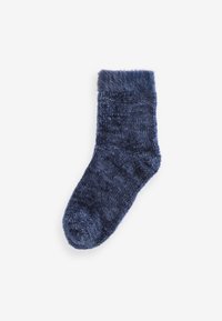 Mørkeblå sok lavet af blødt, struktureret materiale med en fnugget, blød kant øverst. Kroppen har et let plettet mønster.