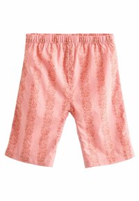 Ljust rosa shorts med elastisk midja, med ett upprepat blommönster i en mörkare nyans av rosa. Slät tygstruktur.
