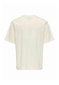 T-shirt med korte ærmer i off-white bomuldsstof, der har rundet halsudskæring og løs pasform, med synlig mærkeetiket bagpå.