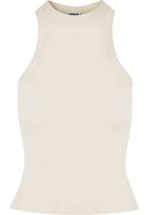 Top sin mangas de canalé en color beige claro con cuello alto y forma ajustada, confeccionado en un material suave y elástico para mayor comodidad.