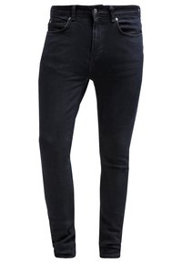 Black denim jeans with a slim fit, featuring five pockets, a standard waistband, and subtle stitching details. Smooth texture.