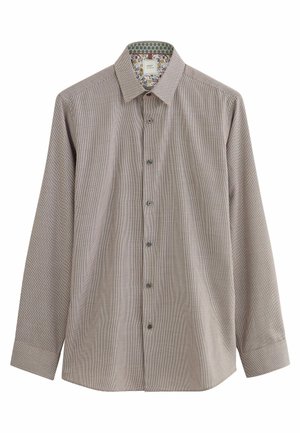 Camisa de hombre de manga larga con botón, con pequeño estampado de pata de gallo en beige y marrón, con forro interior floral en el cuello.