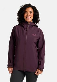 Purple waterproof jacket with a hood, featuring a zip closure and two side pockets. Durable material with a smooth texture and subtle logo detail.
