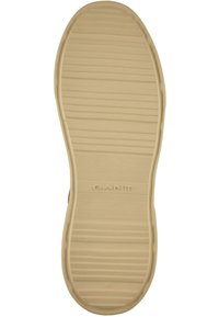 Beige Schuhsohle mit geriffelter Struktur und Markenprägung "GAINT." Verfügt über eine abgerundete Kante und die Größe 42, die auf der Unterseite markiert ist.