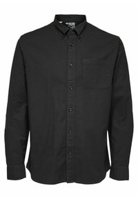 Zwarte knopshirt van katoen, met een puntige kraag, lange mouwen, een borstzak en bijpassende knopen aan de voorkant.