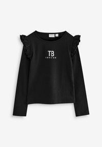 Top negro de manga larga con acentos de volantes en los hombros y texto plateado "TB LONDON" en la parte delantera. Fabricado con una tela suave y elástica.