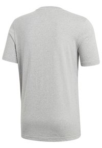 Grå t-shirt med korta ärmar i ett mjukt material, med rundad halsringning och slät yta. Inga synliga logotyper eller dekorationer.