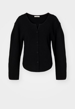 Cardigan noir en tricot côtelé avec un col rond, une fermeture à boutons et des manches larges. Présente une coupe courte et une texture douce.