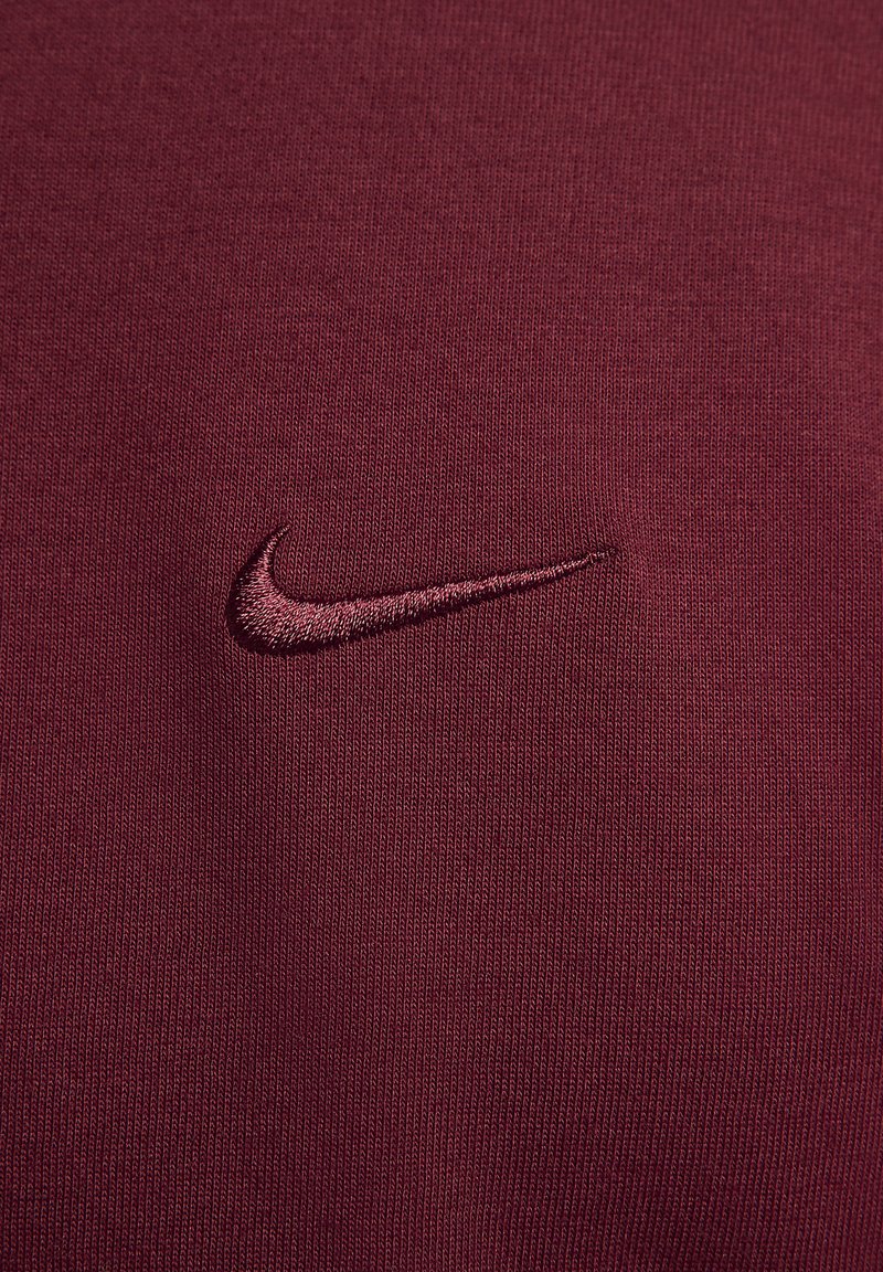 Nike Performance PRIMARY - Sport T-Shirt - dark team red dark team red