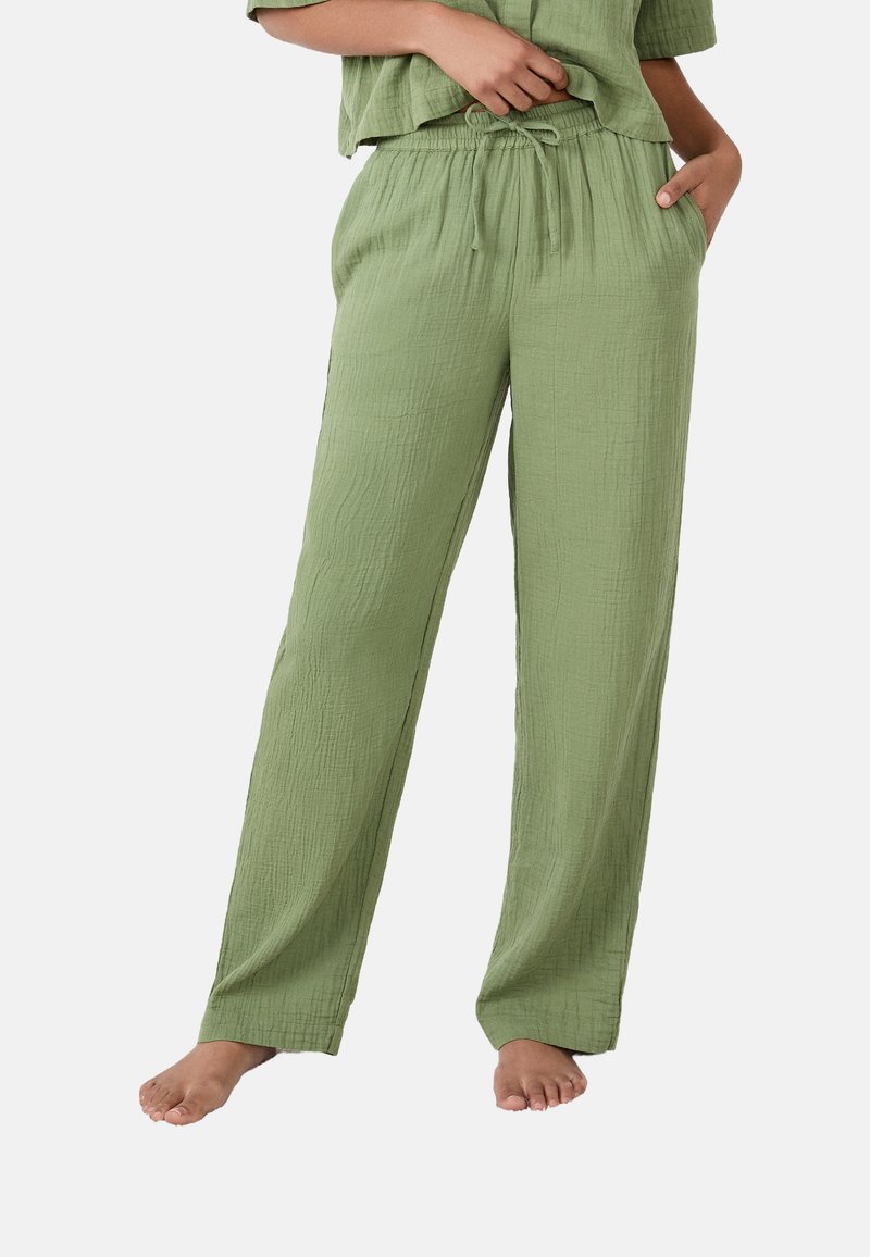 Pantalones verdes, ligeros y texturizados con una cintura elástica, cordón de ajuste y bolsillos laterales. Diseño de pierna recta, adecuados para uso informal.