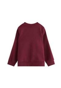 Bordeauxfarvet pullover sweatshirt med lange ærmer, ribbede manchetter og kant, med en kontrasterende hvid sidebånd. Glat bomuldsblandings tekstur.