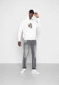Puma PUMA HARIBO HOODIE - Sportinis megztinis - puma white