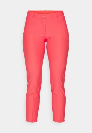 Bright coral pink pants featuring a fitted design with a front zipper, belt loops, and ankle zippers for adjustable length. Smooth texture.
