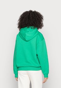 Monki Sweatshirt com capuz - green