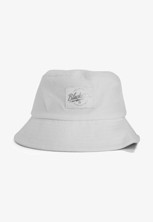 Valge ämbri müts tekstuuriga kangast, mille esiosas on tikitud logo silt. Äär on lai ja ümar, pakkudes piisavalt varju.