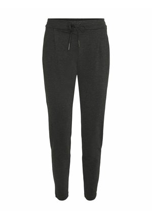 Tumed hallid dressipüksid, mis on valmistatud pehmest kangast, kummiga vöökoha ja kahe esikotiga, ning kitsenevad jalad, et saavutada istuv välimus.