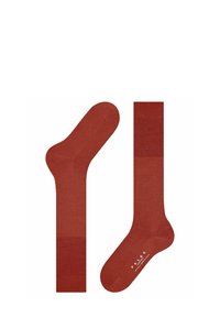 Calze di cotone rosse con una texture liscia, un design semplice e accenti a coste a contrasto sul bordo e sull'arco, con il marchio "FALKE".