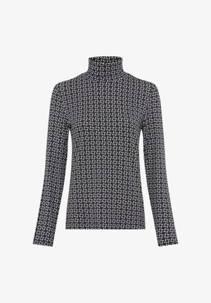 Zwarte lange mouw turtleneck top met een wit geometrisch patroon van met elkaar verbonden gebogen lijnen dat gelijkmatig over de stof verspreid is.