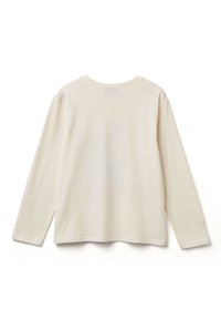 Krémová košile s dlouhým rukávem, kulatým výstřihem, bočními rozparky na lemování a hladkou bavlněnou texturou. Zobrazeno ze zadní strany.