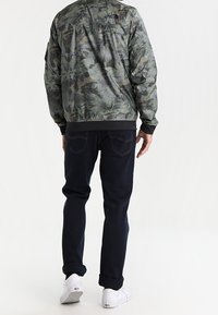 The North Face Hardshelljacke - olive