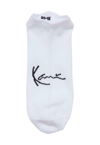 Balti medvilniniai kojinai su žemu kirpimu, su juoda siuvinėta užrašu "Kane" šone. Minkšta tekstūra, bešuvė viršūnė.