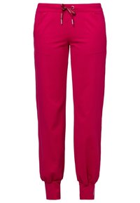 Roze joggerbroek gemaakt van zachte stof, met een elastische tailleband en een trekkoord, twee zijzakken en geribbelde boorden bij de enkels.